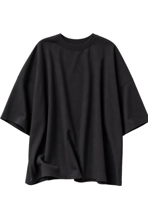 A black oversized short-sleeve t-shirt with a relaxed, draped silhouette, shown against a plain white background.
