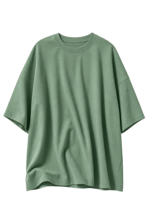 A sage green oversized short-sleeve t-shirt with a relaxed fit, displayed against a solid white background.
